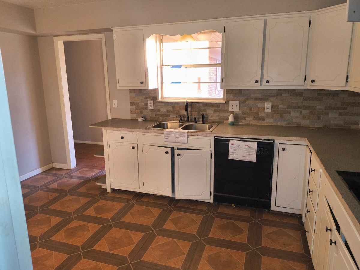 Project 8 before: kitchen geometric floor